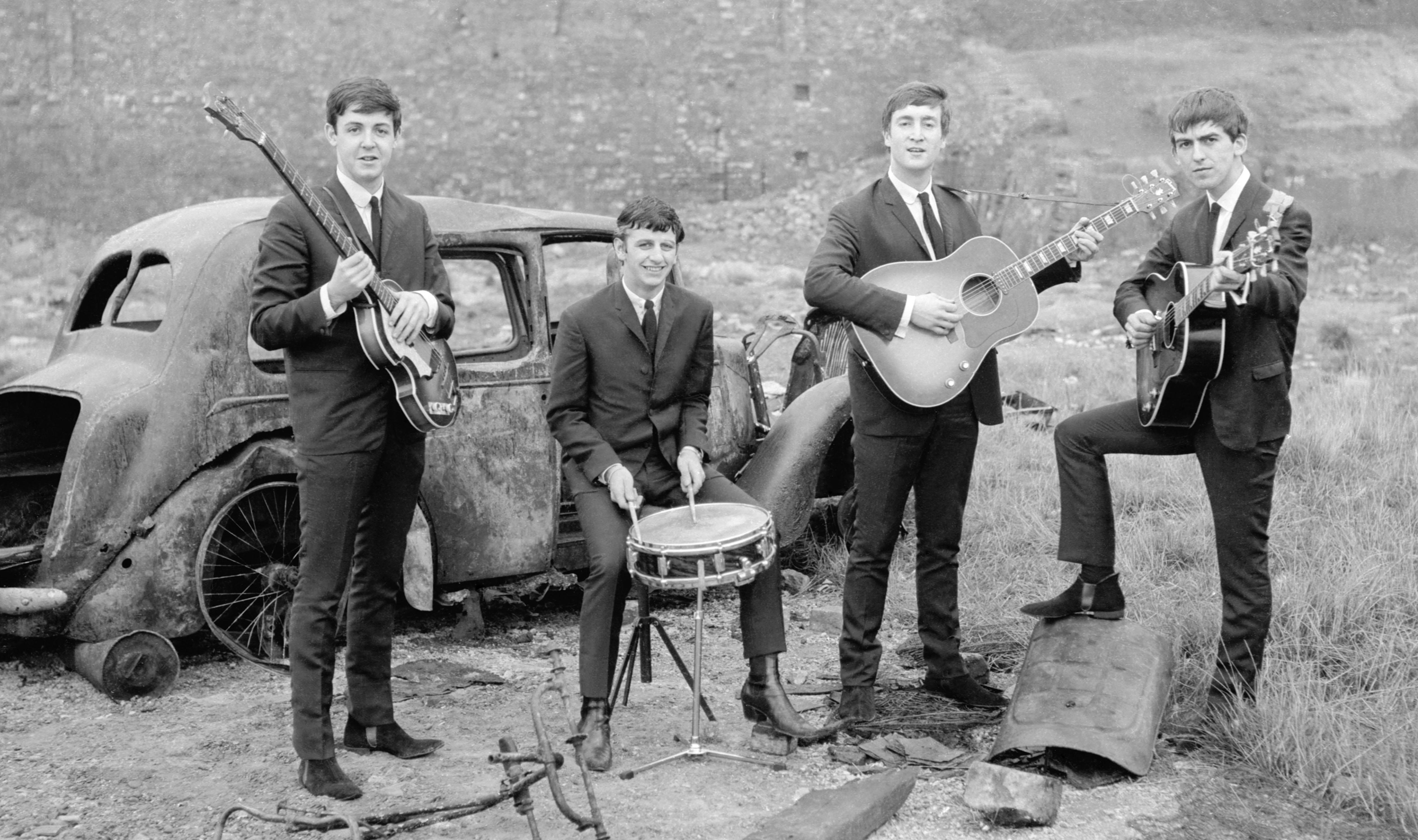 The Beatles in a junkyard
