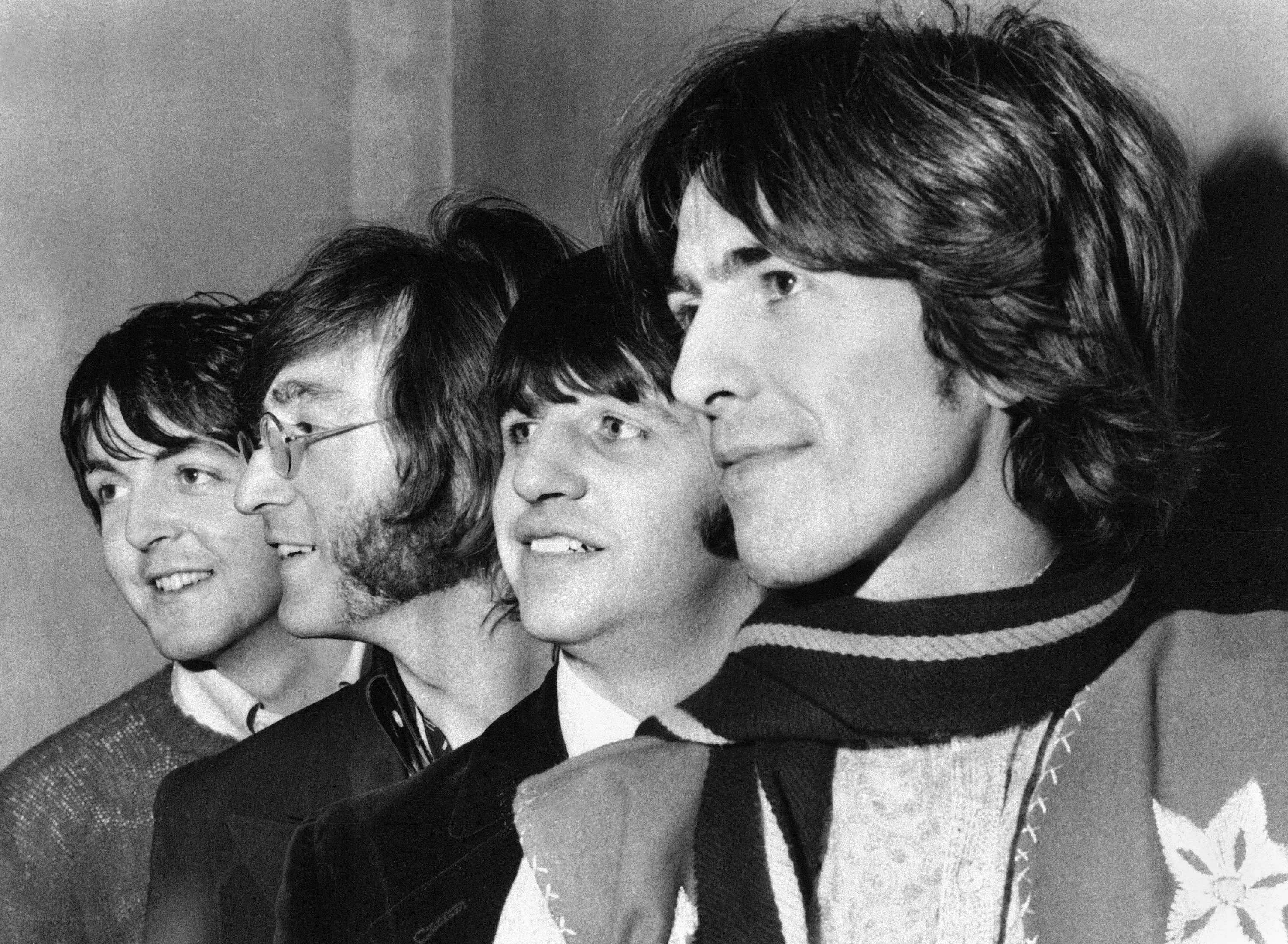 The Beatles in a line