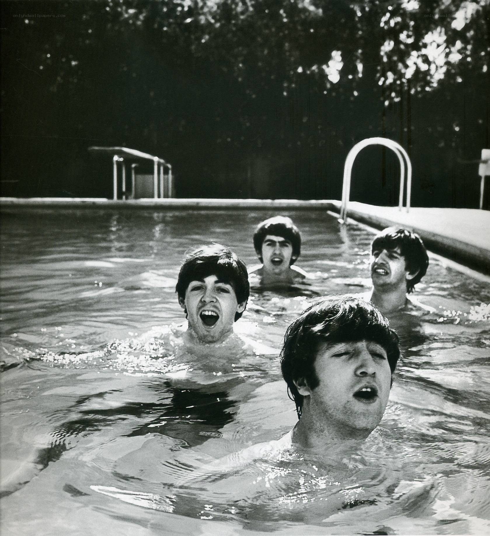 The Beatles in a swimming pool