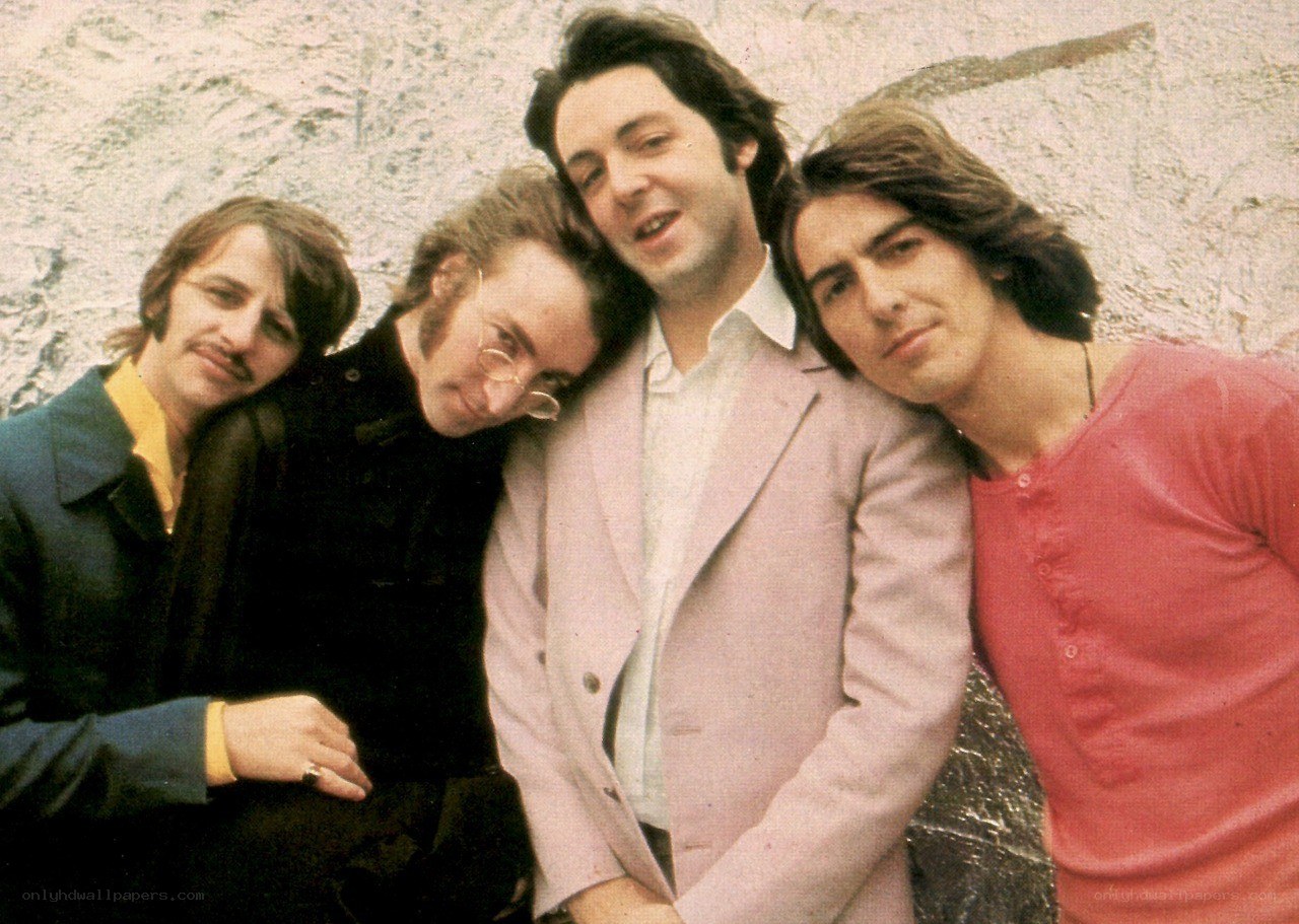 The Beatles in casual pose