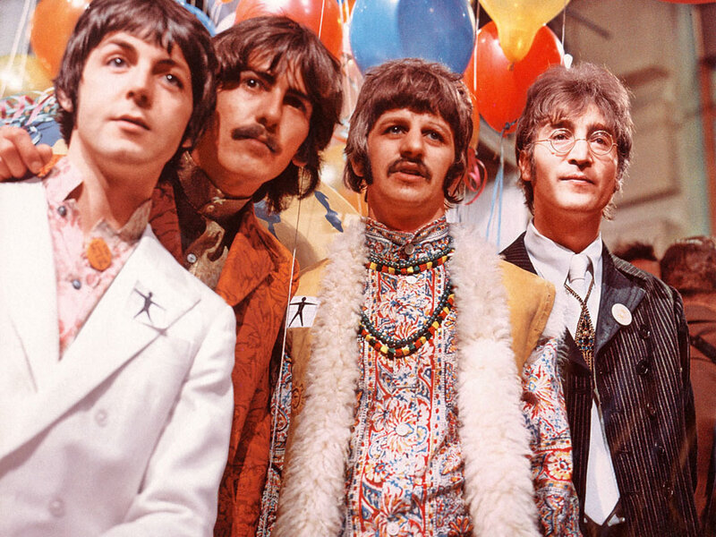 The Beatles in colorful attire