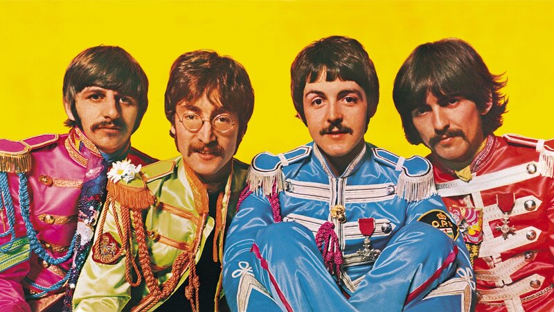The Beatles in colorful uniforms