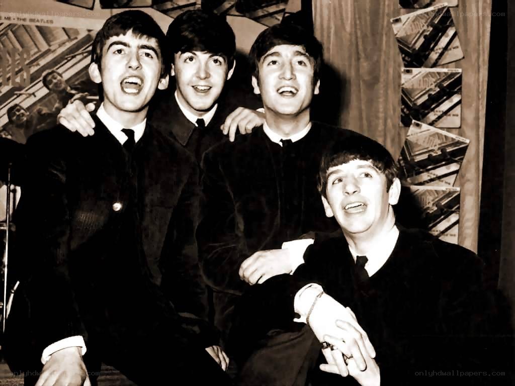 The Beatles in matching suits