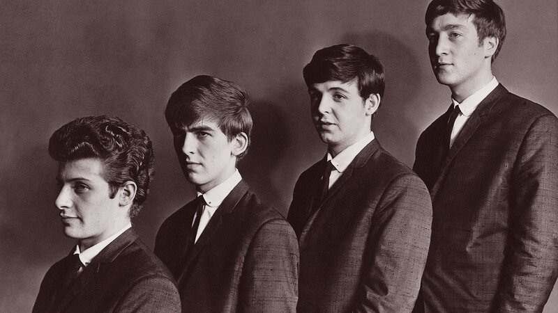 The Beatles in suits