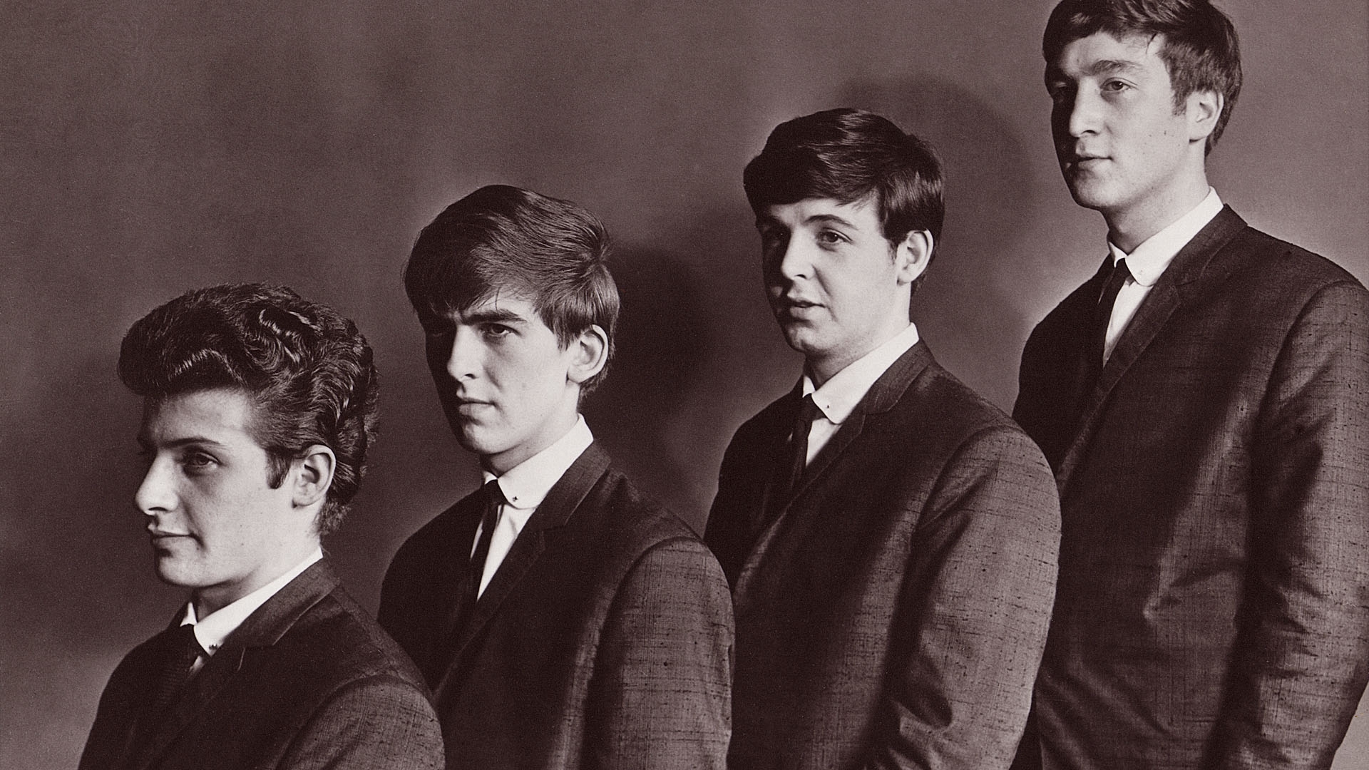 The Beatles in suits