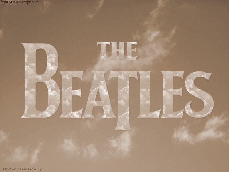 The Beatles logo with clouds