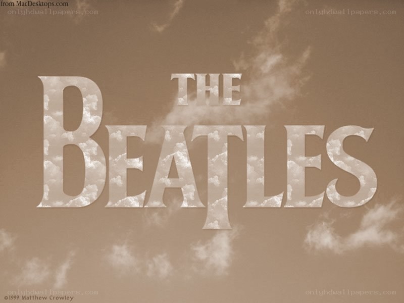 The Beatles logo with clouds