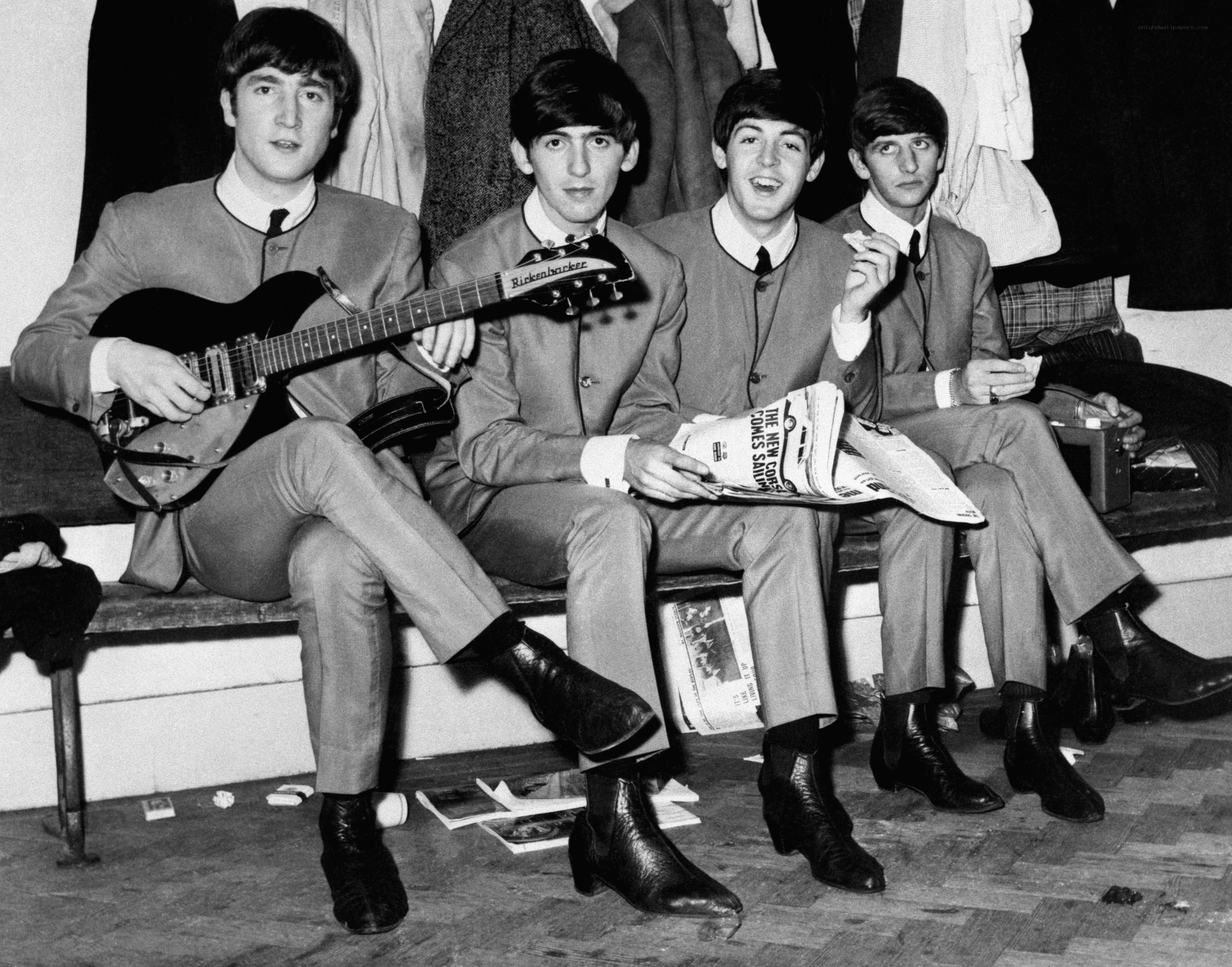 The Beatles on a bench