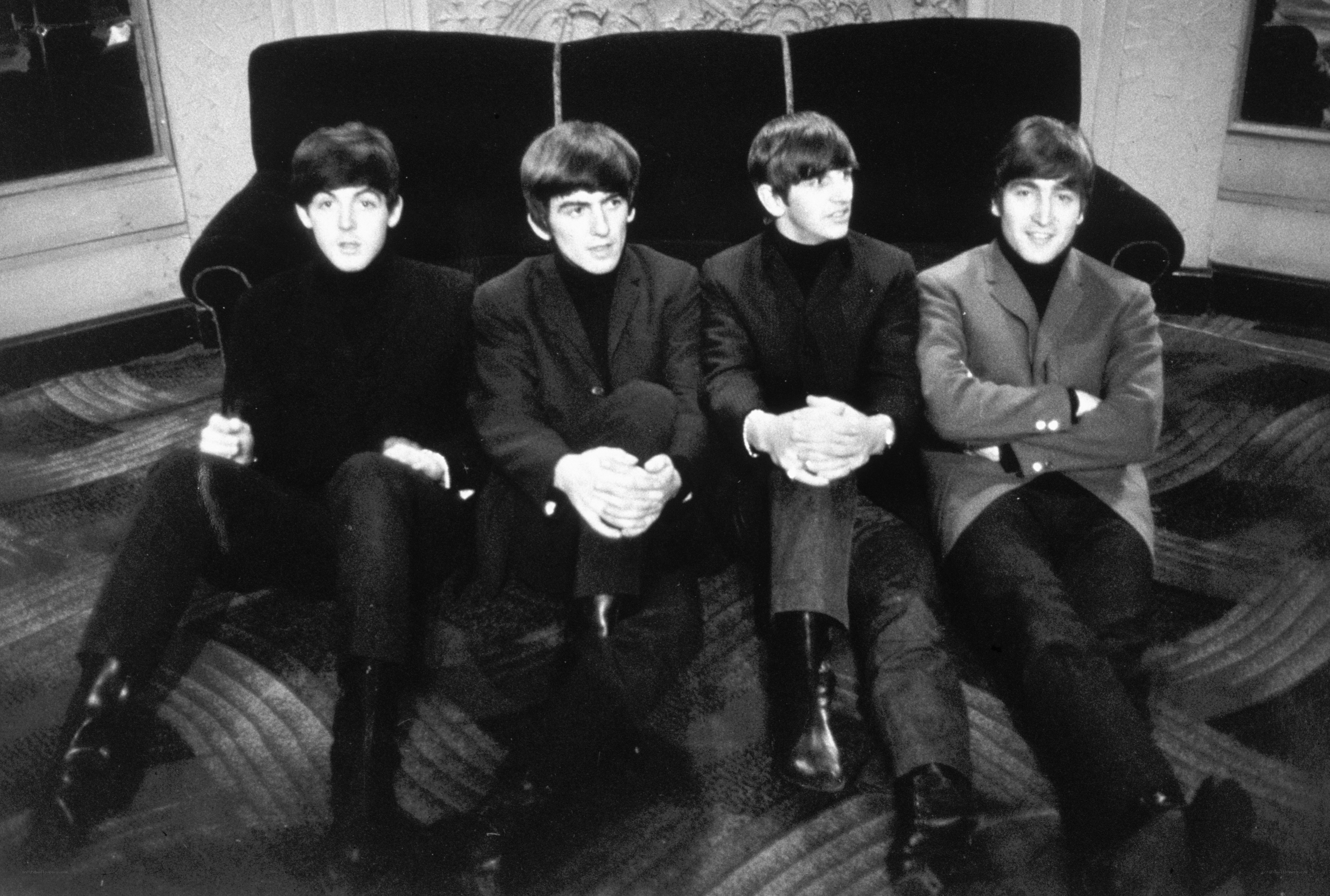 The Beatles on a couch