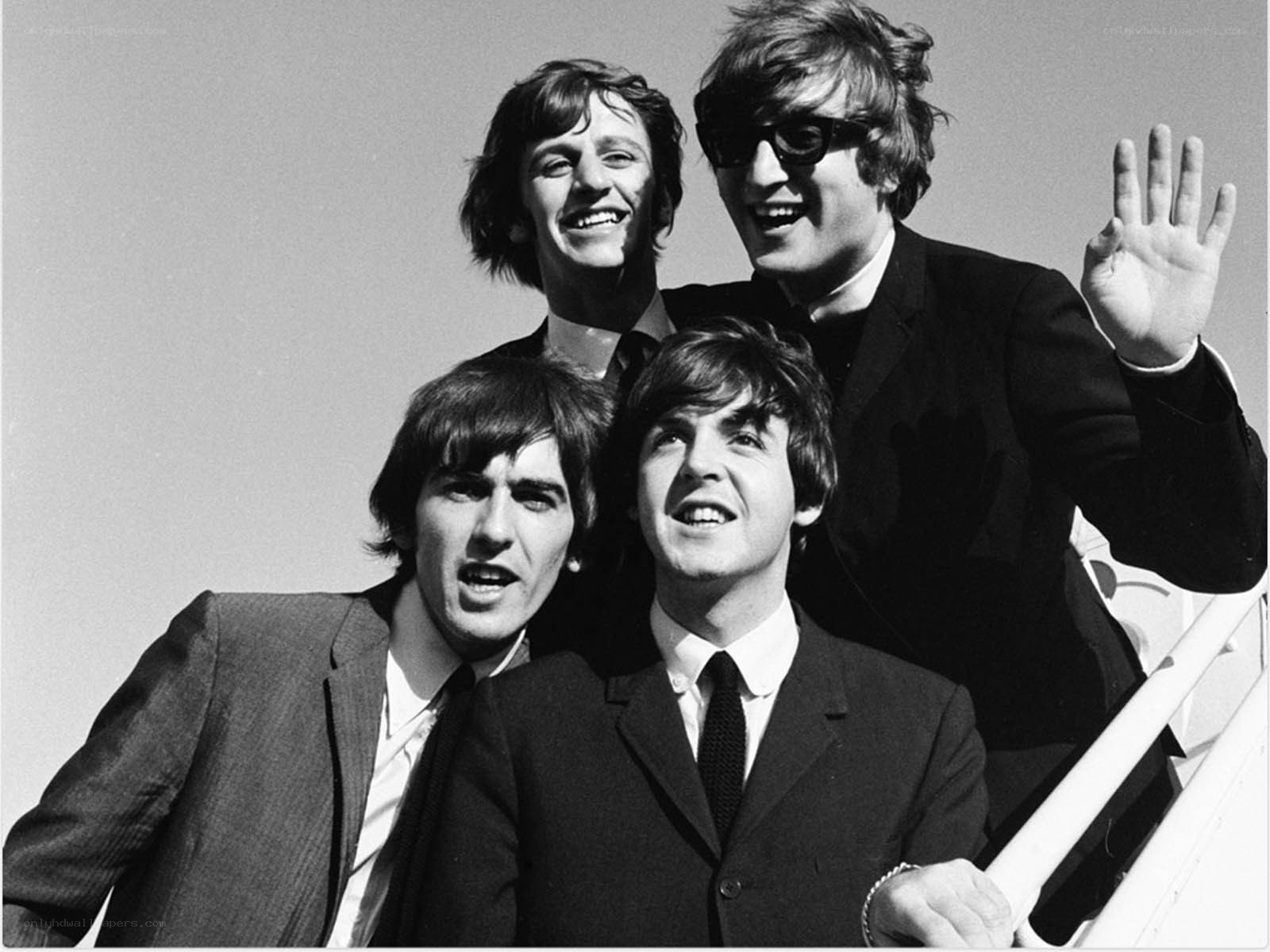 The Beatles on a plane