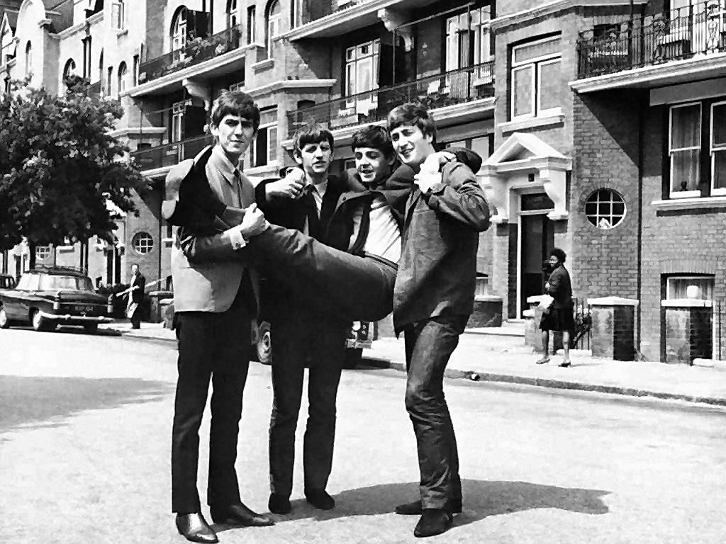 The Beatles on a street