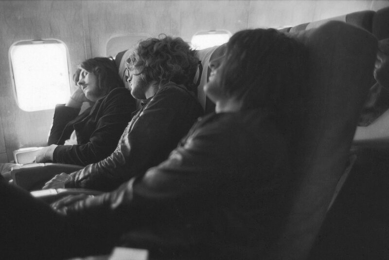 The Beatles on an airplane