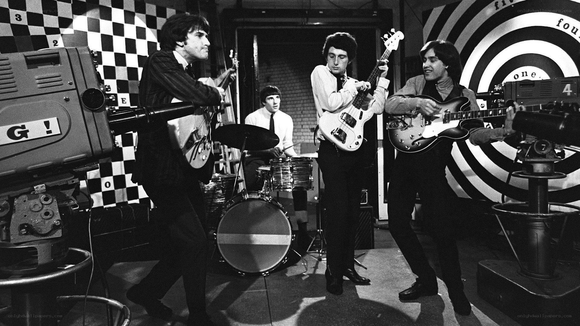 The Beatles performing in studio