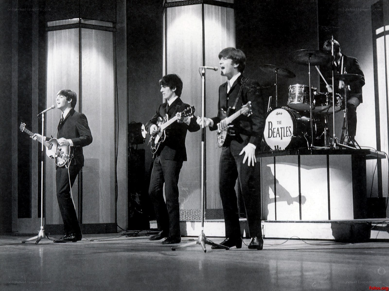 The Beatles performing on stage