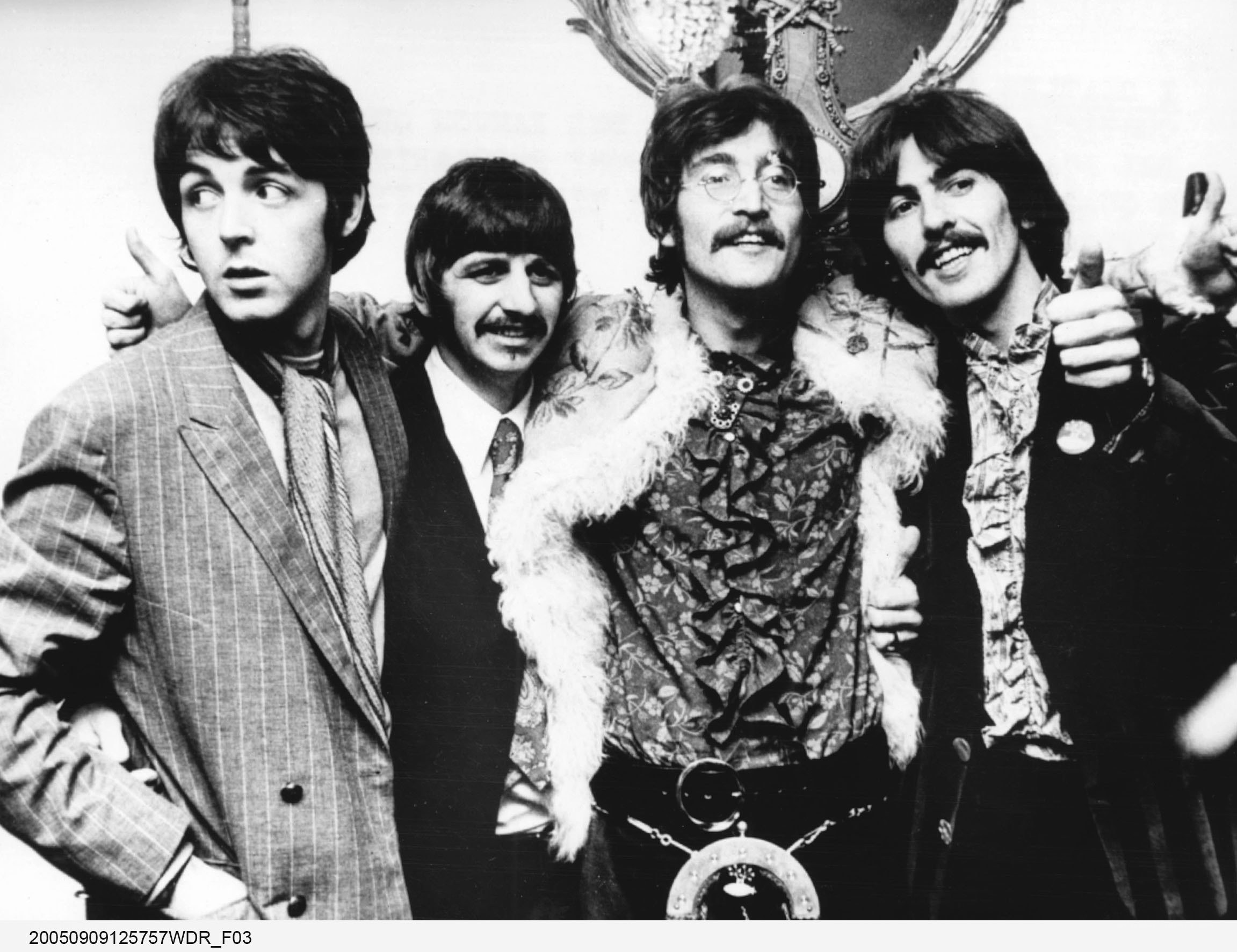 The Beatles pose together