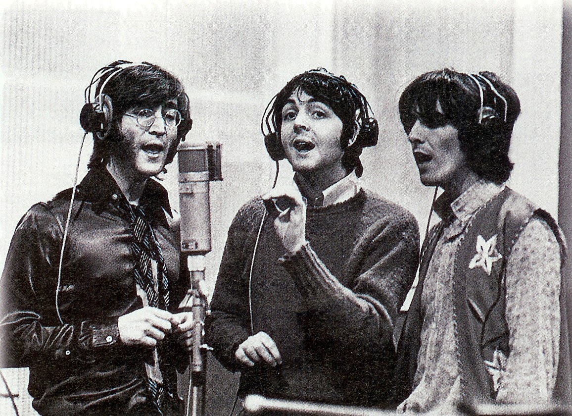 The Beatles recording in studio