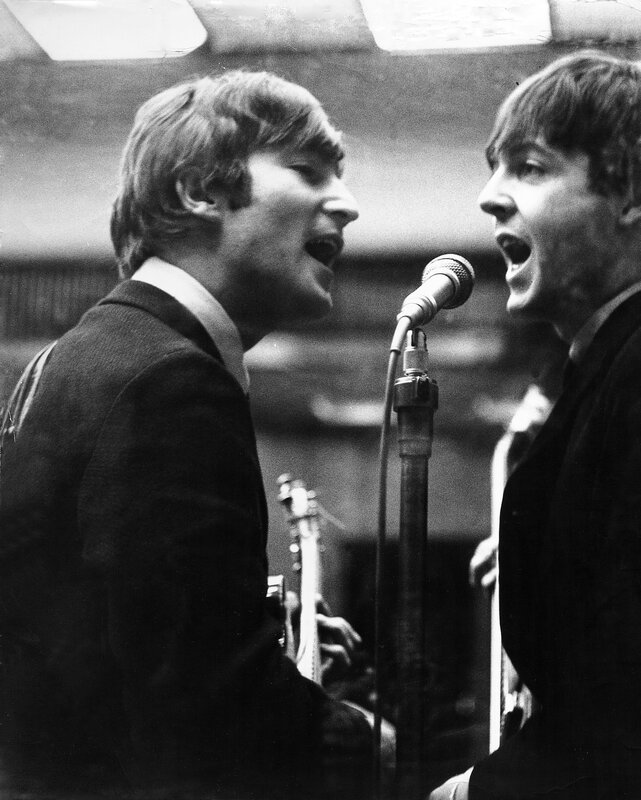 The Beatles singing together