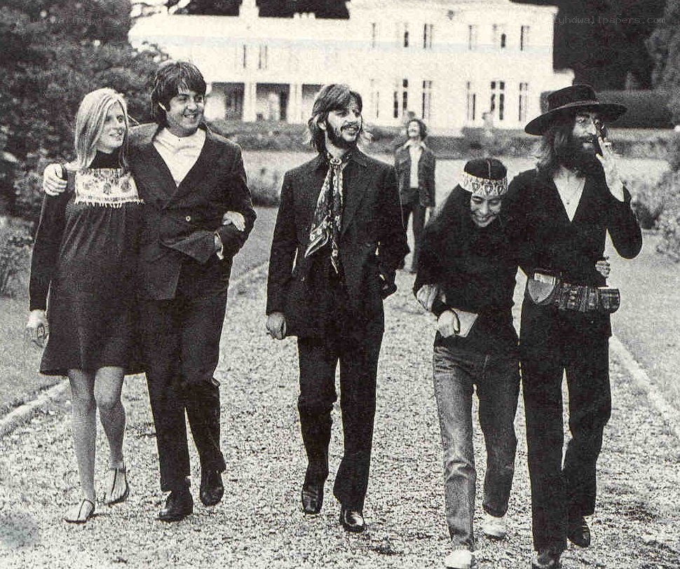 The Beatles walking together