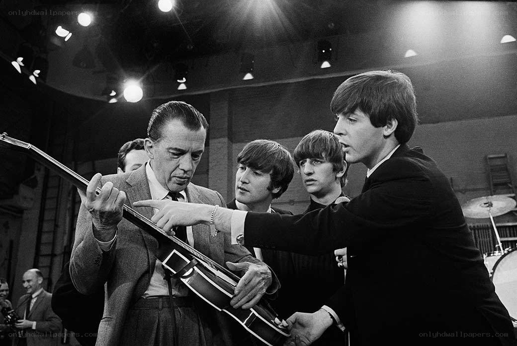 The Beatles with a guitar
