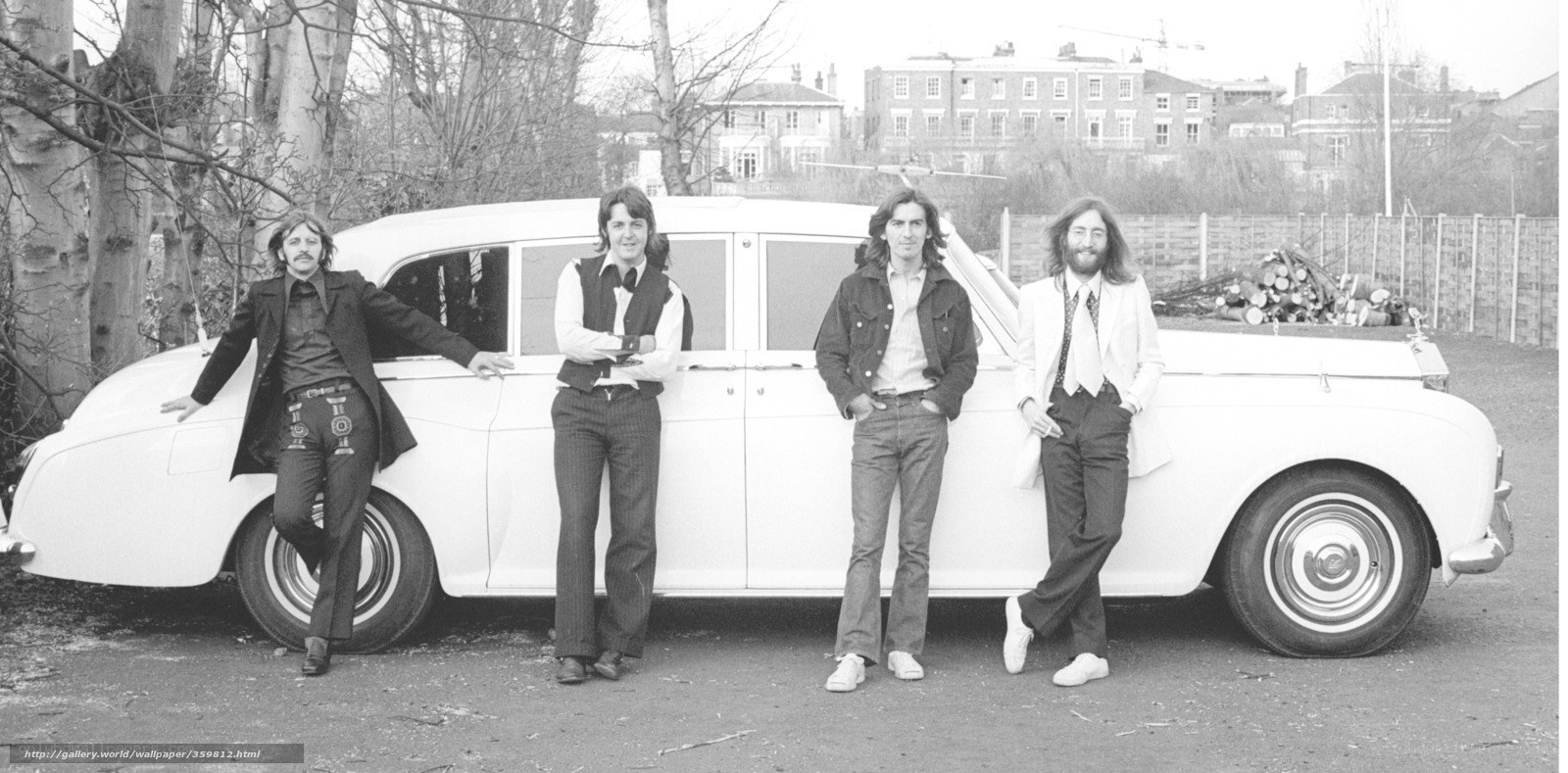 The Beatles with a white car