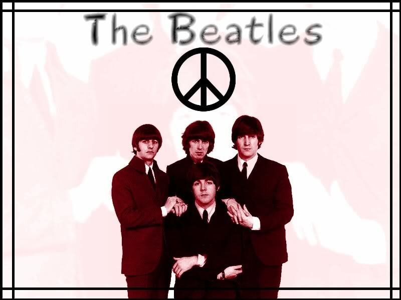 The Beatles with peace symbol