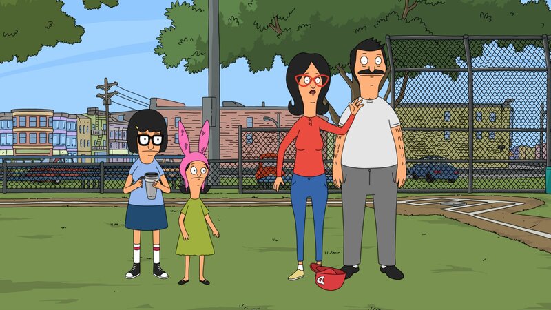 The Belcher family at a baseball field