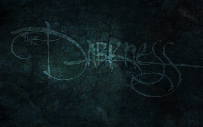 The Darkness logo on dark background