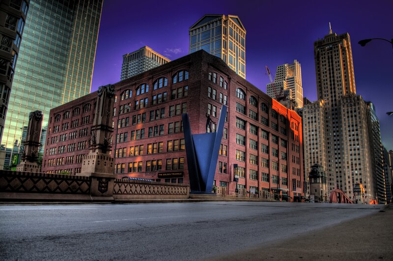 The Golden Triangle building at dusk