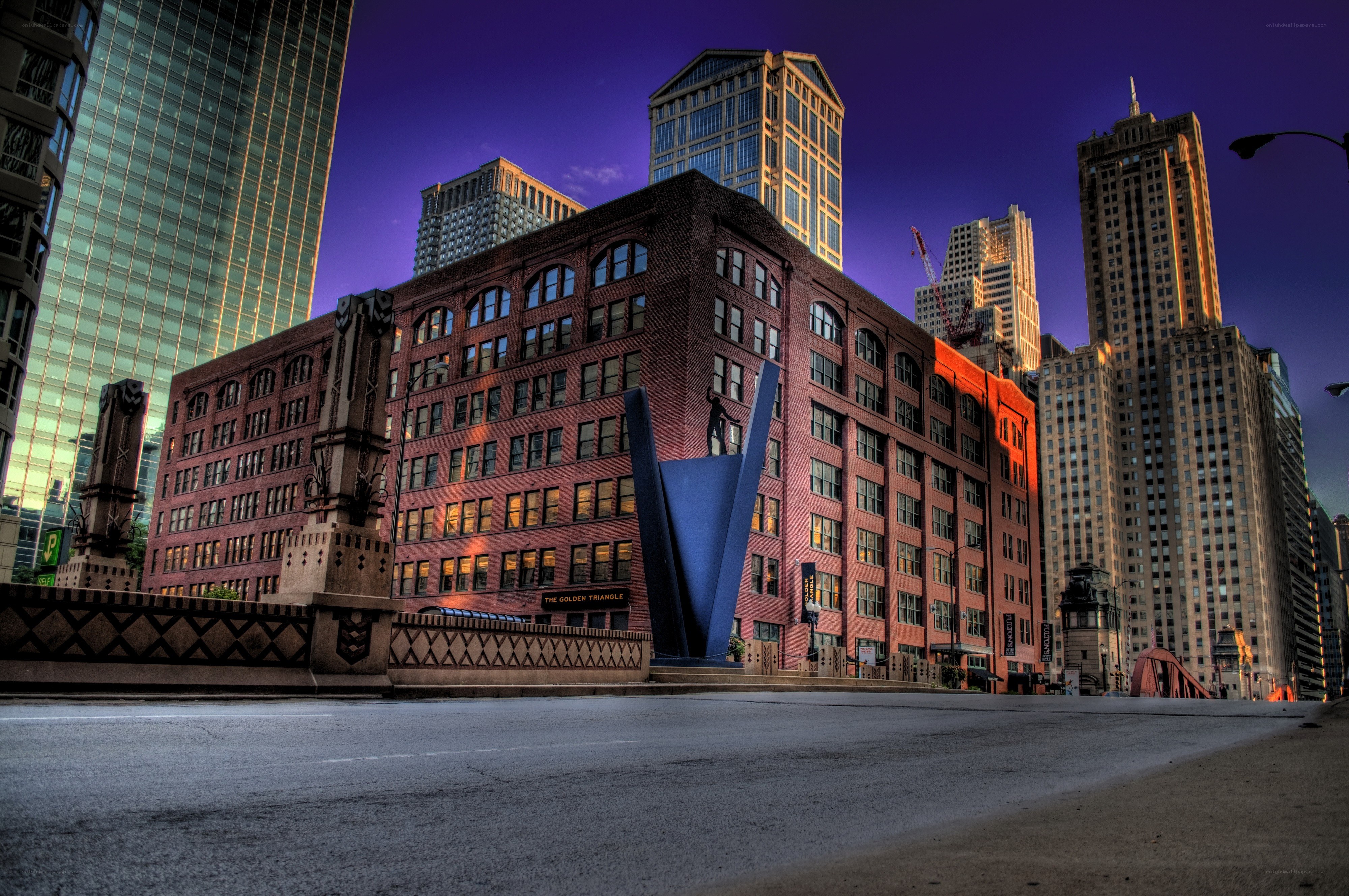The Golden Triangle building at dusk