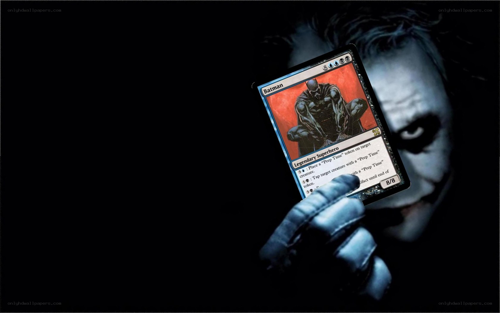 The Joker holding a Batman card