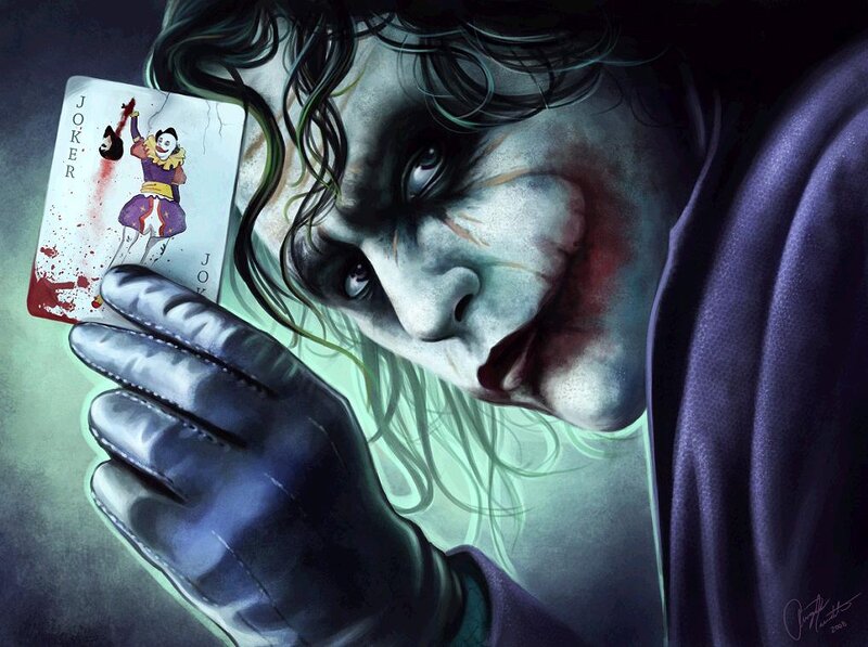 The Joker holding a bloodied card