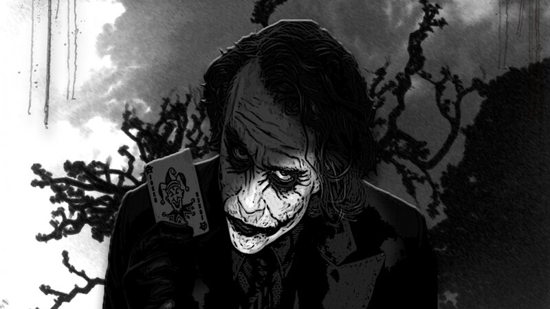 The Joker holding a joker card