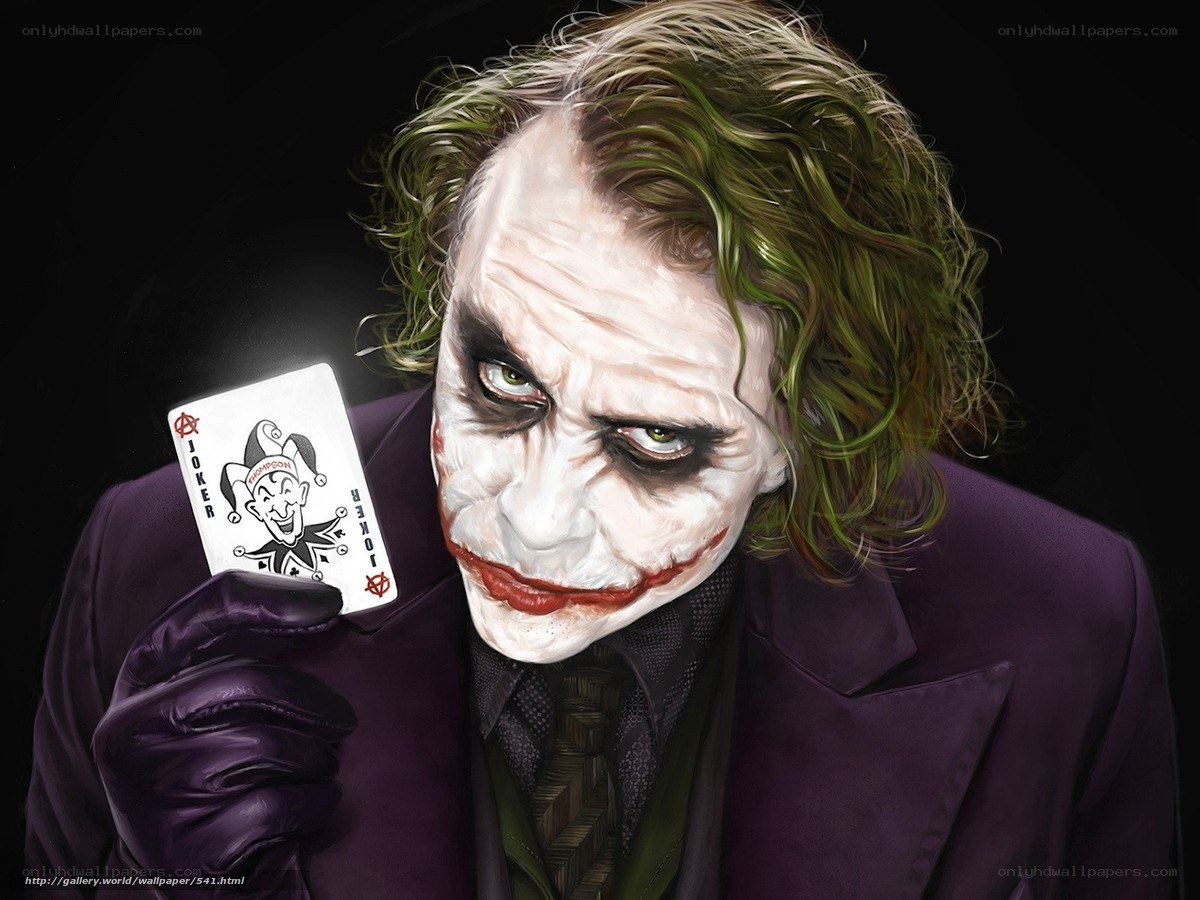 The Joker holding a joker card