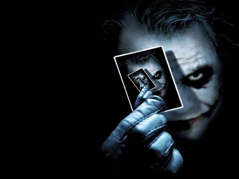 The Joker holding a photo