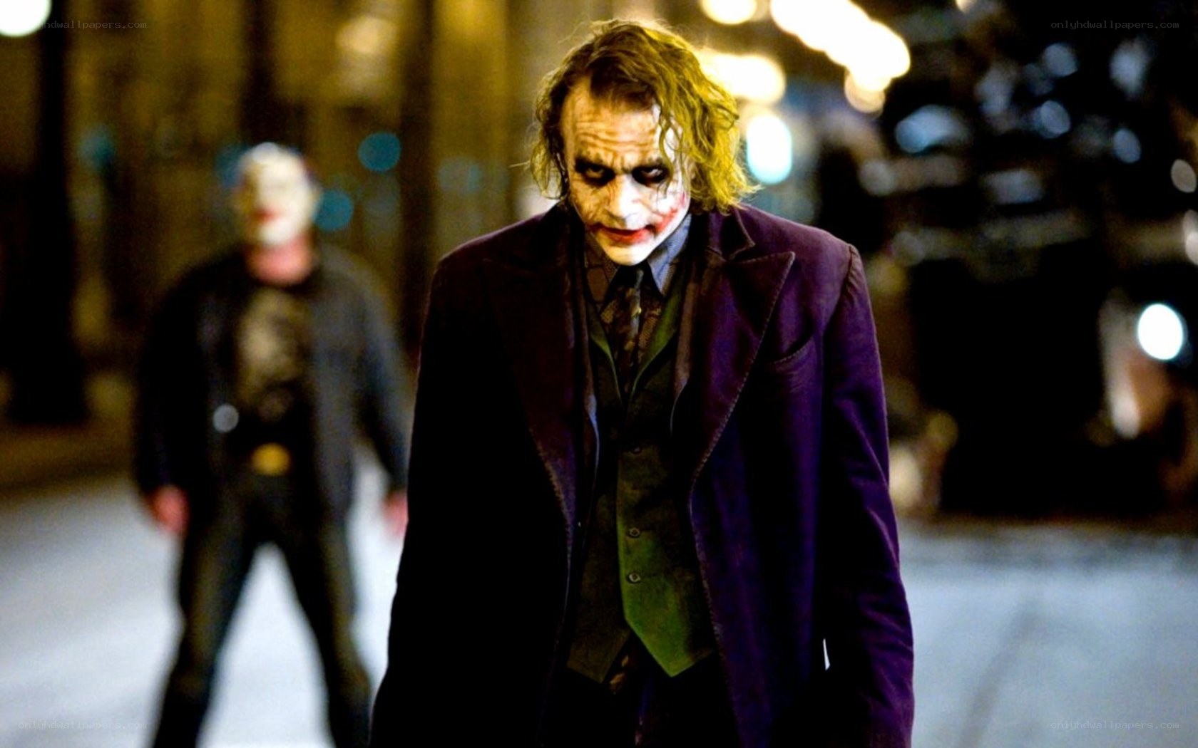 The Joker in a purple coat