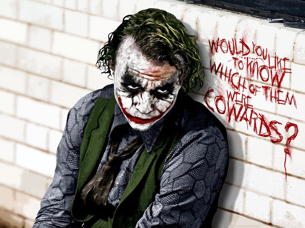 The Joker leaning against a wall