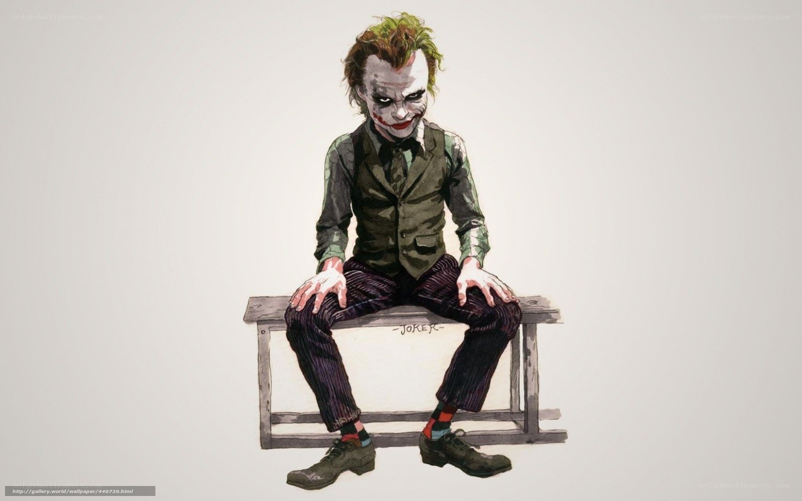 The Joker sitting on a bench