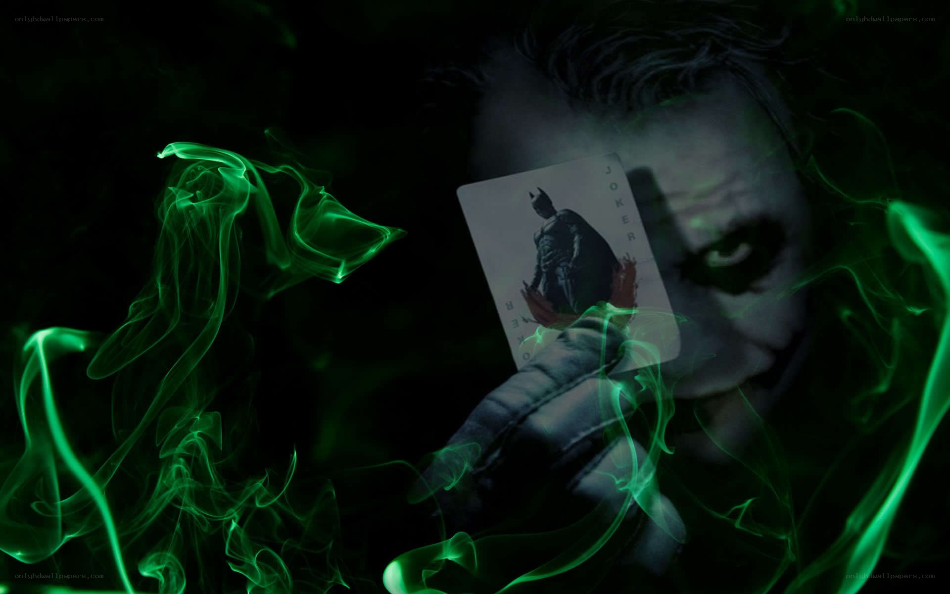 The Joker with a playing card