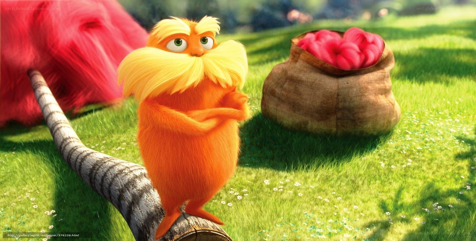 The Lorax stands on a log