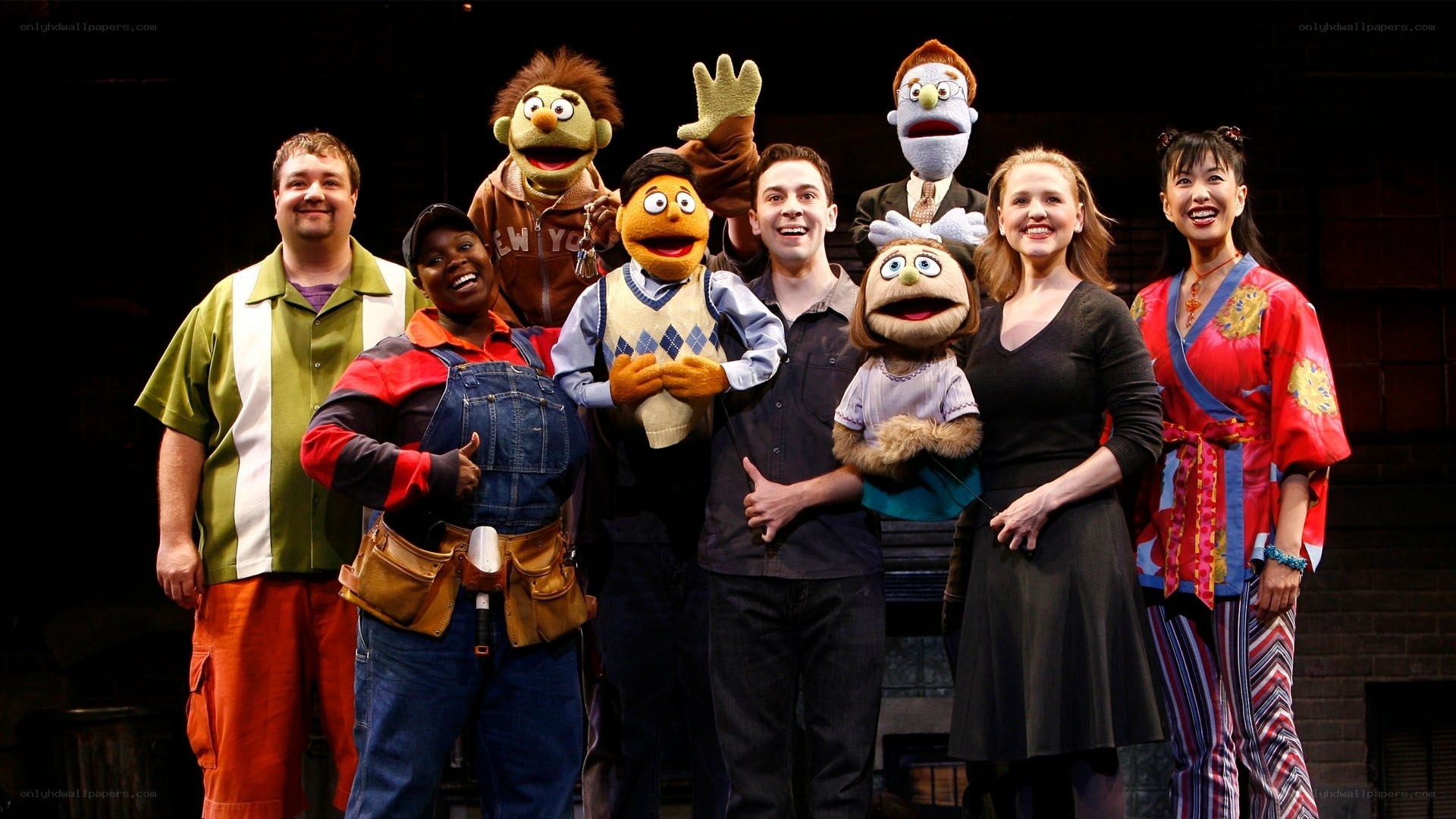 The Muppets cast on stage