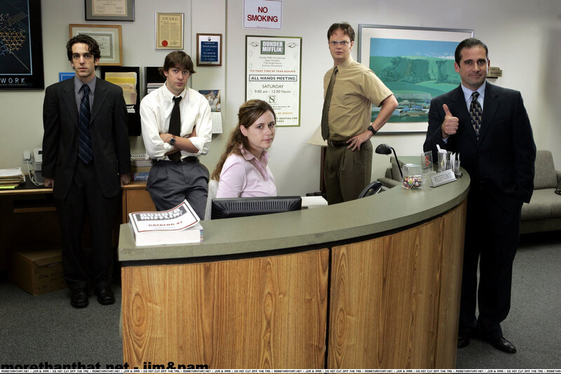 The Office cast at the reception desk