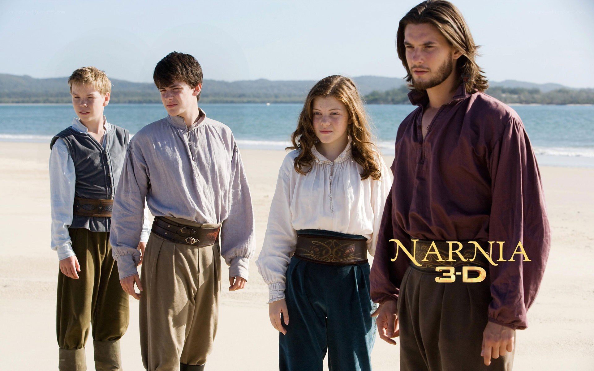The Pevensie siblings on a beach