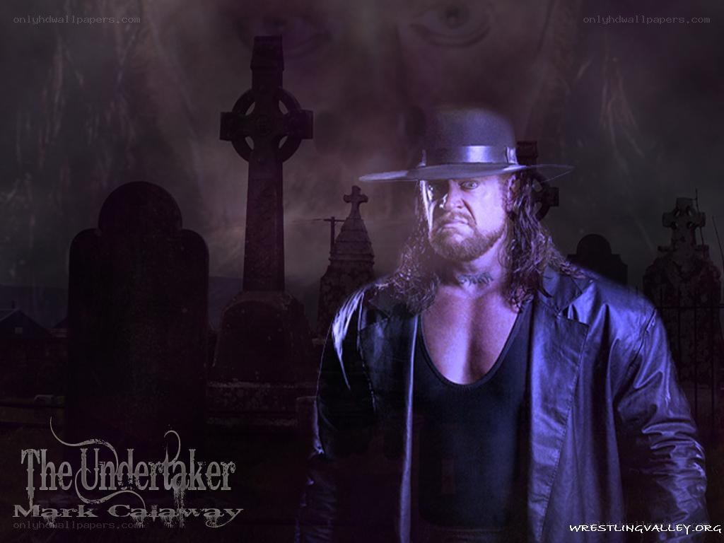 The Undertaker in a graveyard