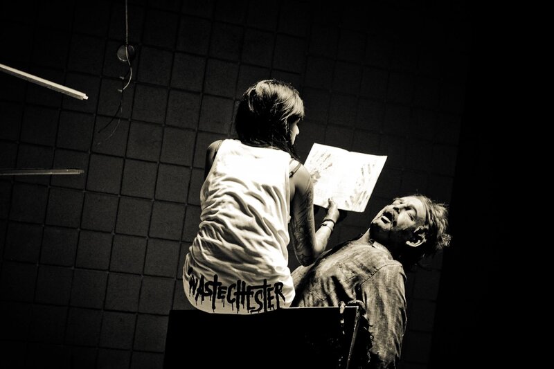 Theater performance with distressed man