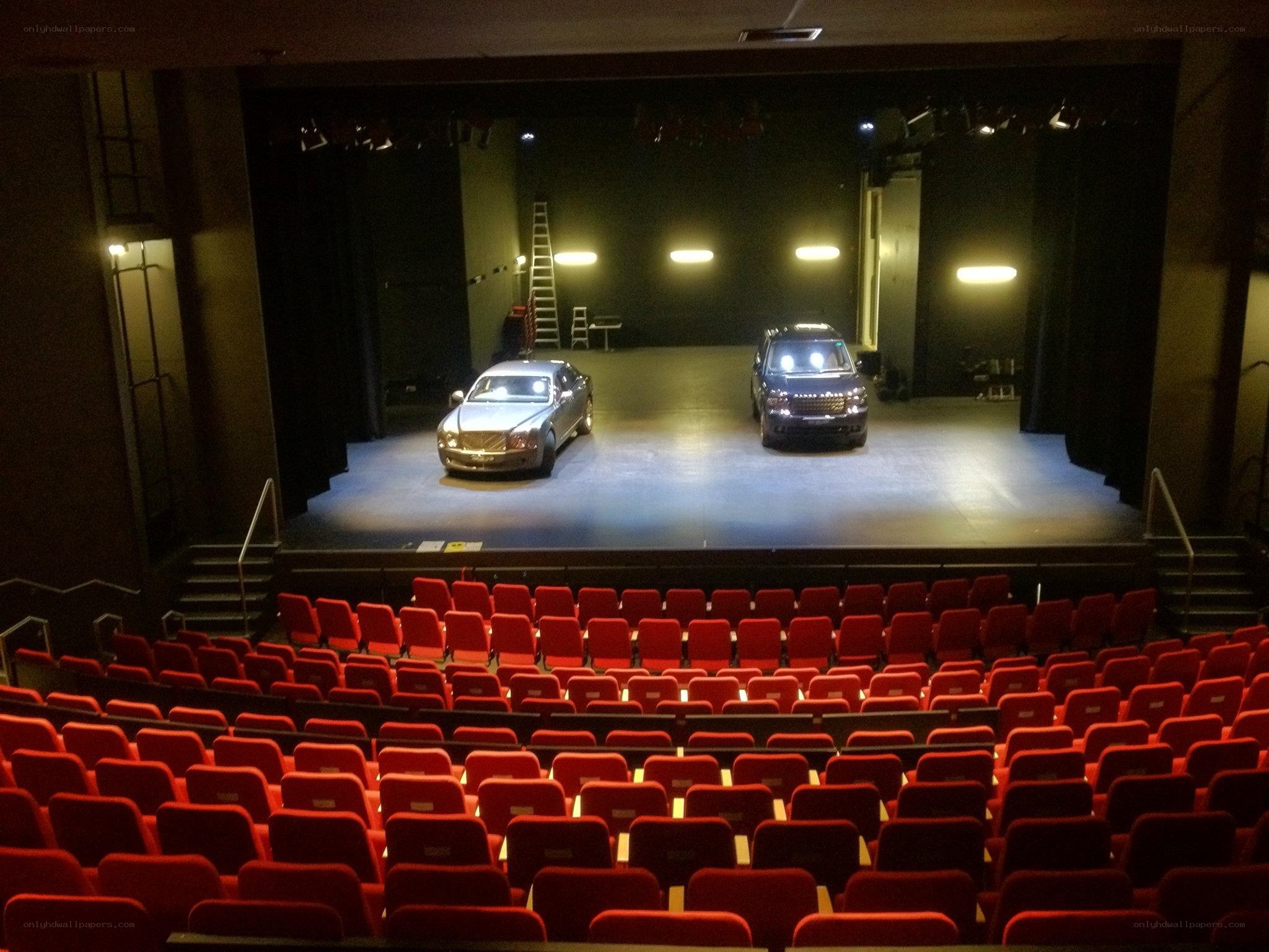 Theater stage with two cars