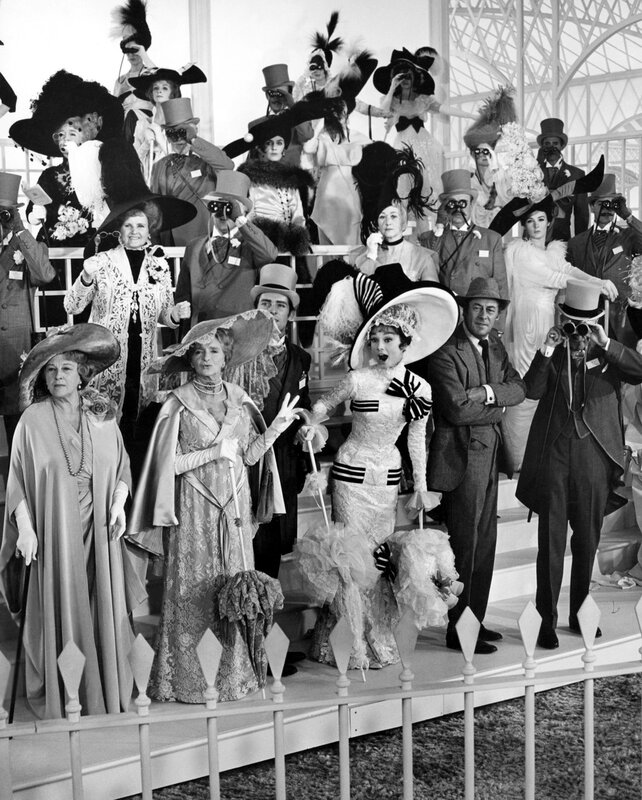 Theatrical cast in period costumes