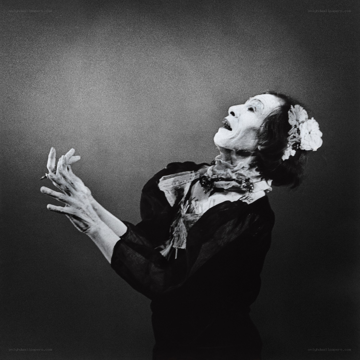 Theatrical performer in white face
