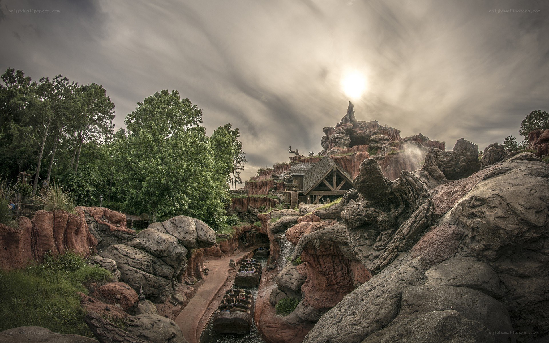 theme park ride with rocky landscape