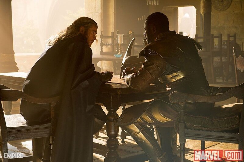 Thor and a warrior at a table