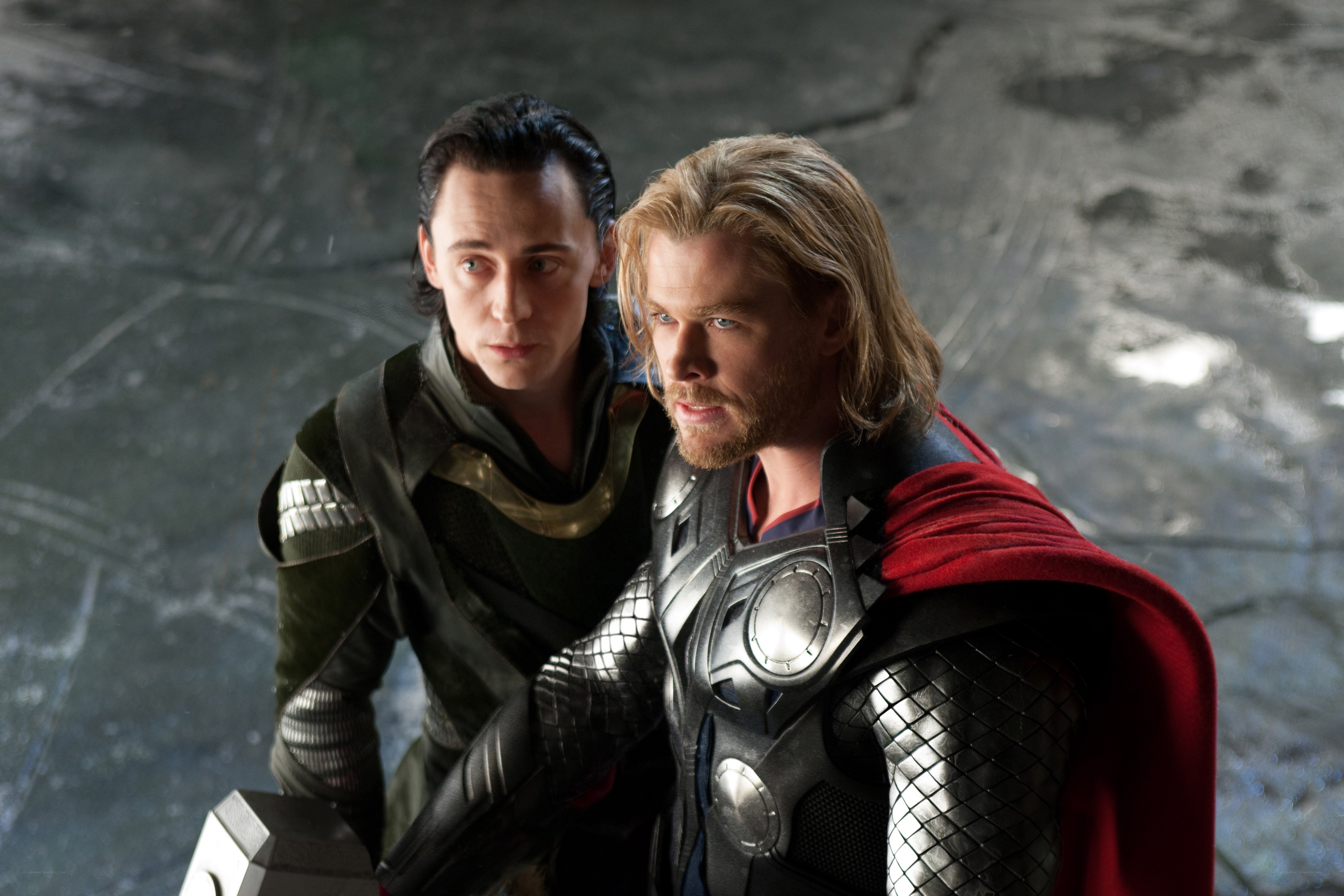 Thor and Loki standing together